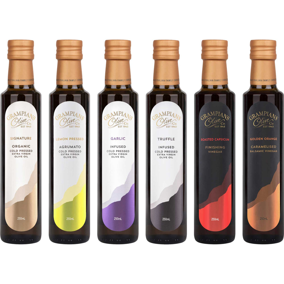 Set of Grampians Olive Co organic Olive Oil & Vinegar bottles with various labels on a white background