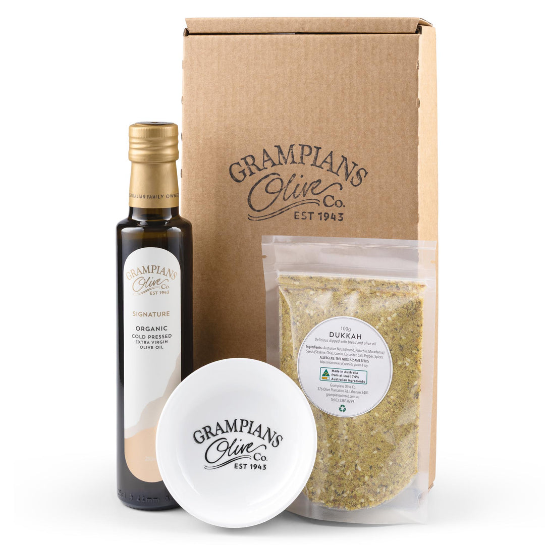 Grampians Olive Co. gift set including olive oil, dukkah, and a dipping dish,on a white background.