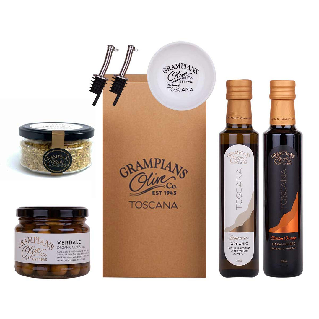 Pantry hamper including organic olive oil, vinegar, olives, dukkah, pourers and dipping dish.